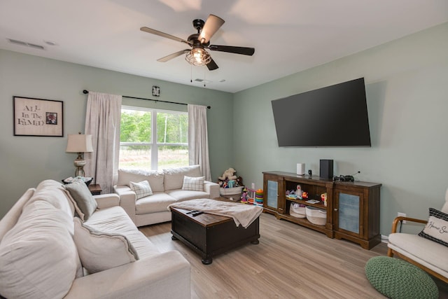 1017 Village Ct, Burns, TN 37029 - living room featuring light wood-type flooring and a ceiling fan