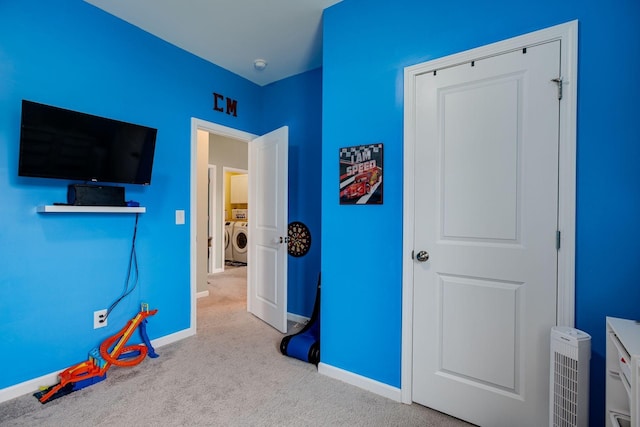 1017 Village Ct, Burns, TN 37029 - carpeted bedroom featuring washing machine and dryer and baseboards