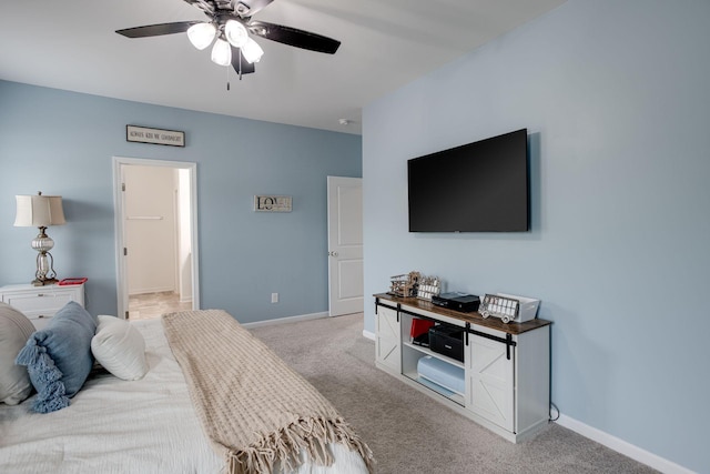 1017 Village Ct, Burns, TN 37029 - carpeted bedroom with baseboards, ceiling fan, and ensuite bathroom