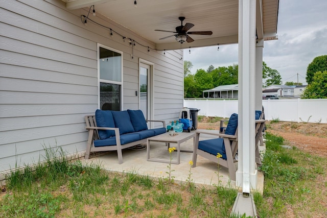1017 Village Ct, Burns, TN 37029 - view of patio / terrace with an outdoor hangout area, ceiling fan, and fence