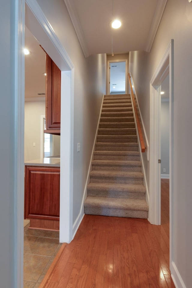 3024 Brookside Path, Murfreesboro, TN 37128 - staircase with wood finished floors, baseboards, and crown molding
