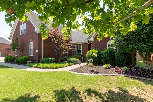 3024 Brookside Path, Murfreesboro, TN 37128 - view of front of property featuring a front yard, brick siding, and roof with shingles