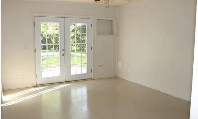 149 Hollywood Blvd, Gallatin, TN 37066 - doorway to outside with french doors, healthy amount of natural light, a ceiling fan, and concrete flooring