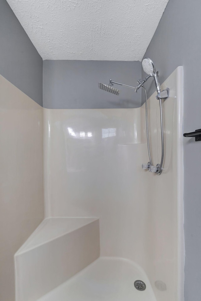 6109 Ebenezer Rd, Greenbrier, TN 37073 - full bathroom with a shower and a textured ceiling