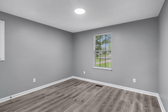 6109 Ebenezer Rd, Greenbrier, TN 37073 - empty room with wood finished floors and baseboards