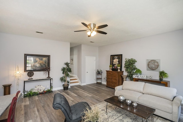 5943 Colchester Dr, Hermitage, TN 37076 - living area featuring a ceiling fan, wood finished floors, baseboards, and stairs