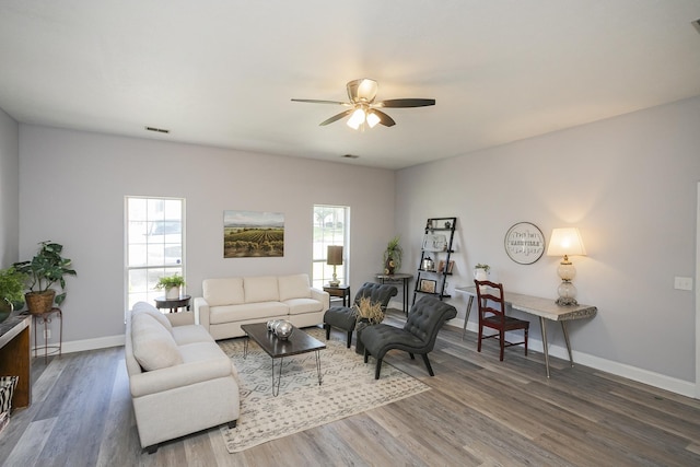 5943 Colchester Dr, Hermitage, TN 37076 - living area featuring a ceiling fan, plenty of natural light, wood finished floors, and baseboards