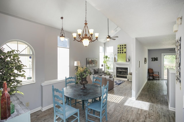 5943 Colchester Dr, Hermitage, TN 37076 - dining space with wood finished floors, healthy amount of natural light, a chandelier, and lofted ceiling