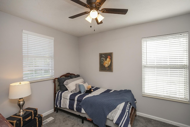 5943 Colchester Dr, Hermitage, TN 37076 - bedroom with carpet flooring, multiple windows, baseboards, and a ceiling fan