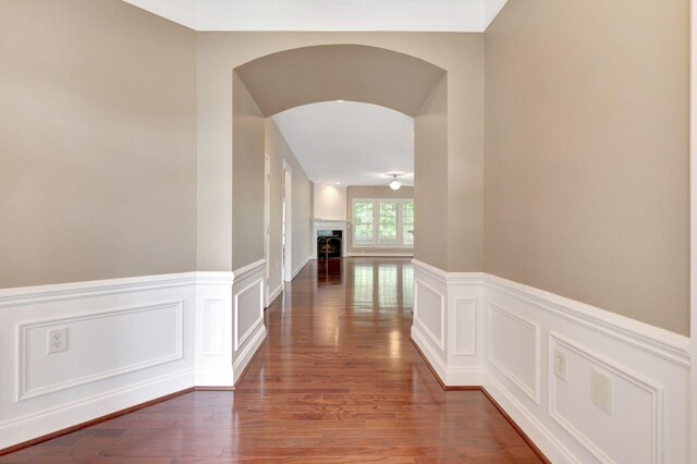 221 Antebellum Ln, Mount Juliet, TN 37122 - corridor with wood finished floors, a decorative wall, wainscoting, and arched walkways