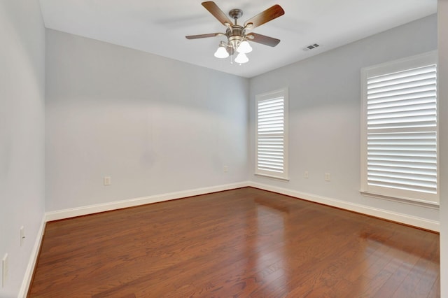 221 Antebellum Ln, Mount Juliet, TN 37122 - empty room with dark wood-style flooring, ceiling fan, and baseboards