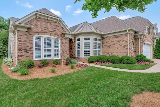 221 Antebellum Ln, Mount Juliet, TN 37122 - view of front facade featuring brick siding, a front yard, a garage, and driveway