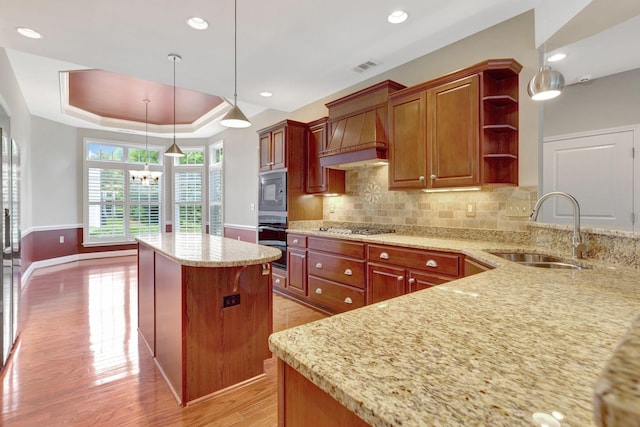 221 Antebellum Ln, Mount Juliet, TN 37122 - kitchen with a sink, custom range hood, light wood-type flooring, open shelves, and light stone countertops