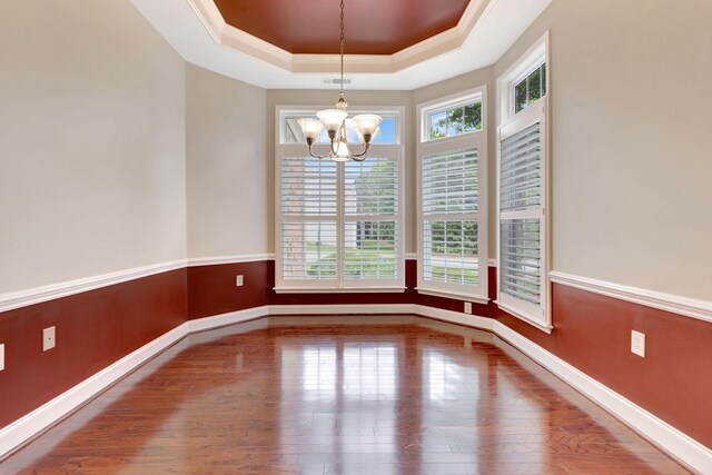 221 Antebellum Ln, Mount Juliet, TN 37122 - spare room featuring a raised ceiling, a chandelier, hardwood / wood-style floors, baseboards, and ornamental molding