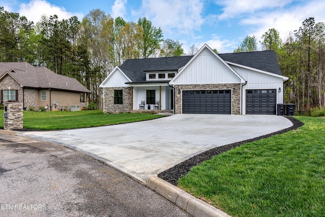 355 Shadows Lawn Dr, Athens, TN 37303 - modern farmhouse style home with stone siding, a garage, a front lawn, concrete driveway, and a porch