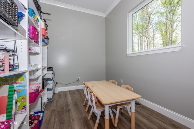 355 Shadows Lawn Dr, Athens, TN 37303 - dining room featuring wood finished floors, crown molding, and baseboards