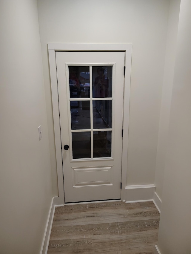 1305 Ellington Dr, Lafayette, TN 37083 - doorway with wood finished floors and baseboards