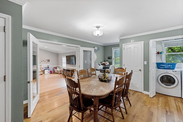 503 Dawn Pl, Lebanon, TN 37087 - dining area featuring light wood finished floors, french doors, healthy amount of natural light, and ornamental molding