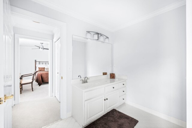 5313 Curlybark Pl, Brentwood, TN 37027 - ensuite bathroom featuring crown molding, vanity, and baseboards