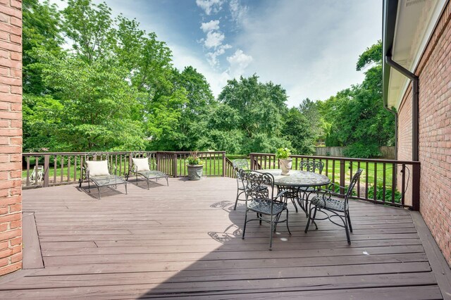 5313 Curlybark Pl, Brentwood, TN 37027 - wooden terrace featuring outdoor dining area and view of scattered trees