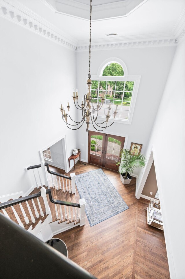 5313 Curlybark Pl, Brentwood, TN 37027 - entryway with a chandelier, healthy amount of natural light, french doors, ornamental molding, and wood finished floors