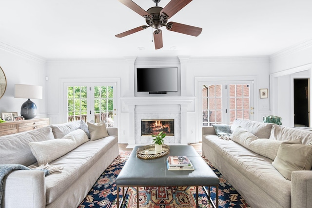 5313 Curlybark Pl, Brentwood, TN 37027 - living area with ceiling fan, ornamental molding, a premium fireplace, and wood finished floors