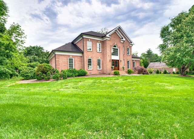5313 Curlybark Pl, Brentwood, TN 37027 - colonial house with brick siding and a front lawn