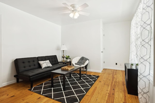 8324 River Road Pike, Nashville, TN 37209 - living room with baseboards, light wood-type flooring, and ceiling fan