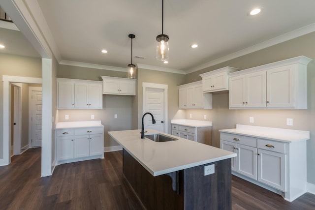 110 Canter Rd, Lascassas, TN 37085 - kitchen featuring a sink, an island with sink, ornamental molding, white cabinets, and dark wood-type flooring