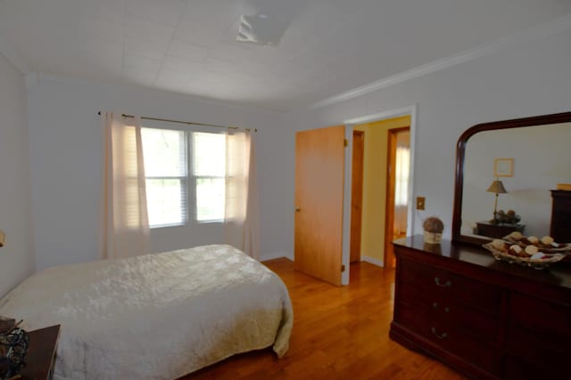 9073 Sherwood Rd, Sherwood, TN 37376 - bedroom with crown molding and light wood-type flooring