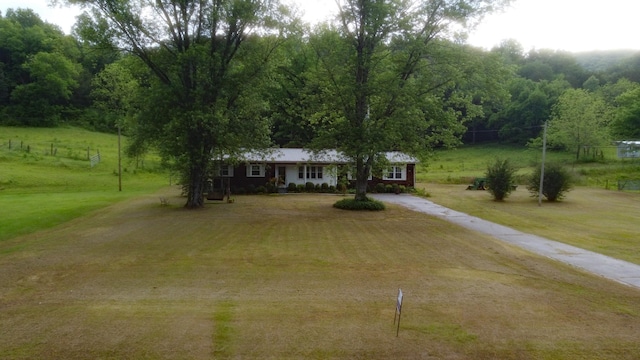 9073 Sherwood Rd, Sherwood, TN 37376 - ranch-style home with driveway and a front lawn