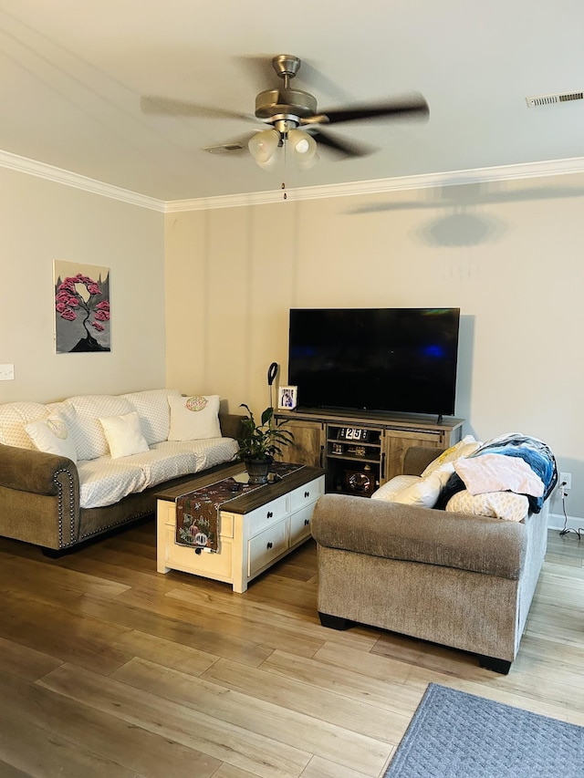 967 Horse Mountain Rd # 2-D, Shelbyville, TN 37160 - living room featuring crown molding, a ceiling fan, and light wood finished floors