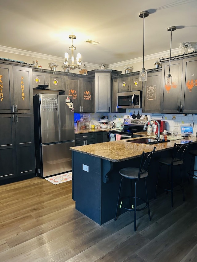 967 Horse Mountain Rd # 2-D, Shelbyville, TN 37160 - kitchen with appliances with stainless steel finishes, a sink, stone countertops, a peninsula, and decorative backsplash
