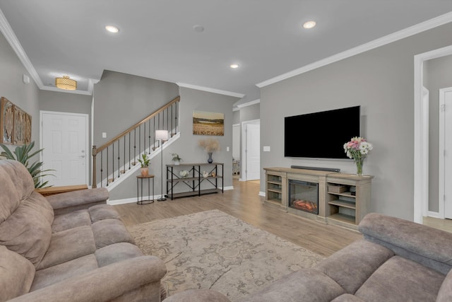 1753 Humphreys Gln, Spring Hill, TN 37174 - living area featuring wood finished floors, stairs, ornamental molding, baseboards, and recessed lighting