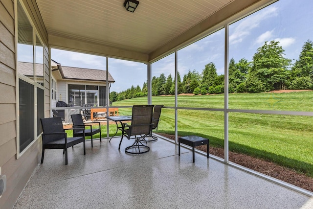 1753 Humphreys Gln, Spring Hill, TN 37174 - sunroom featuring healthy amount of natural light, outdoor dining area, and view of scattered trees