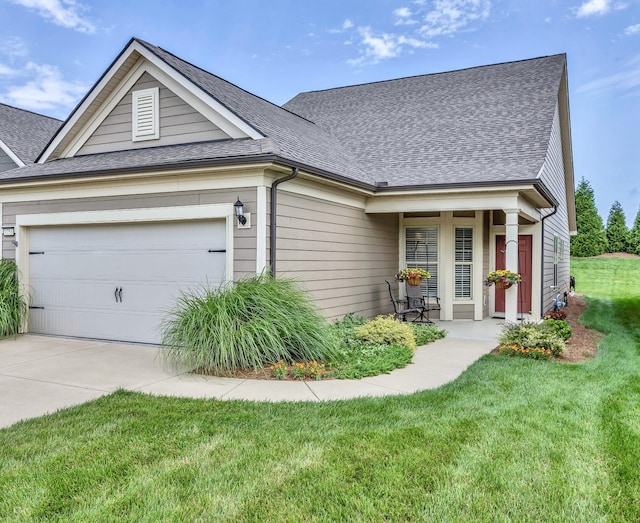 1753 Humphreys Gln, Spring Hill, TN 37174 - view of front of house featuring roof with shingles, concrete driveway, a garage, and a front lawn