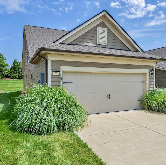 1753 Humphreys Gln, Spring Hill, TN 37174 - view of front facade with roof with shingles, concrete driveway, and a front yard