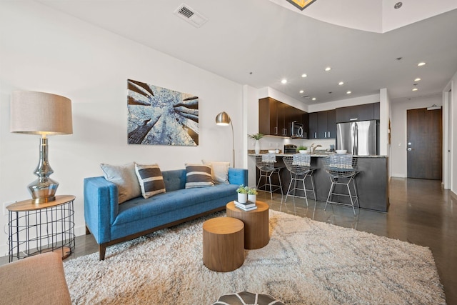 1510 Demonbreun St Unit 712, Nashville, TN 37203 - living room featuring recessed lighting