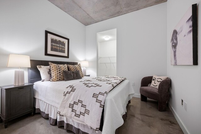 1510 Demonbreun St Unit 712, Nashville, TN 37203 - bedroom featuring concrete floors and baseboards