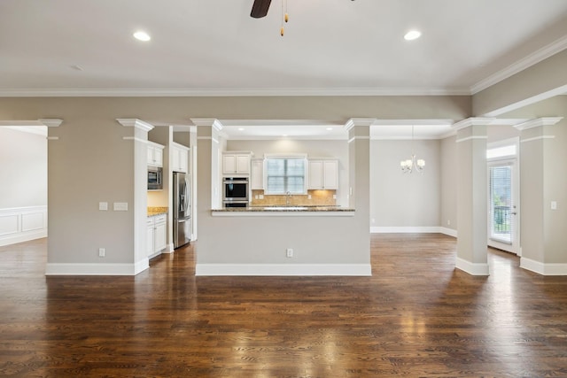 4101 Owen Watkins Ct, Franklin, TN 37067 - unfurnished living room featuring decorative columns, a chandelier, a ceiling fan, dark wood finished floors, and ornamental molding