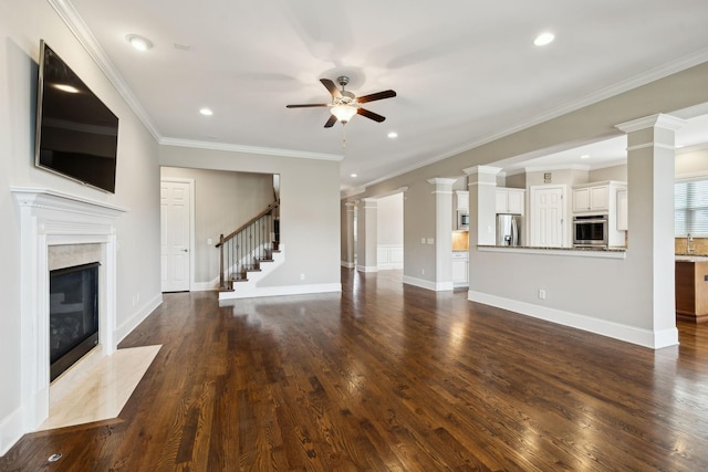 4101 Owen Watkins Ct, Franklin, TN 37067 - unfurnished living room featuring a ceiling fan, a fireplace, stairway, dark wood finished floors, and recessed lighting