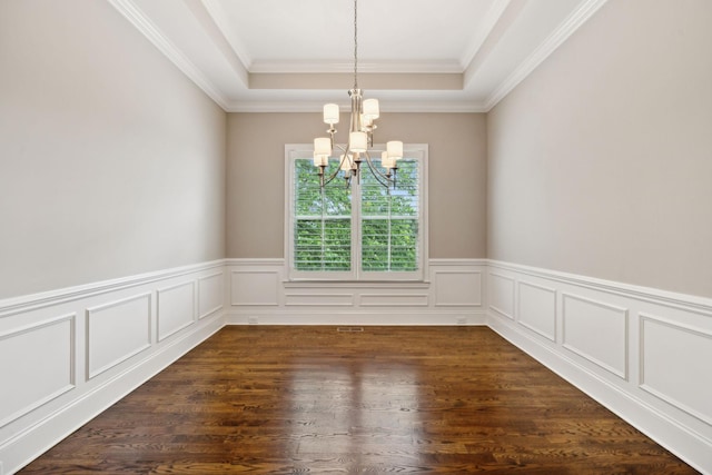 4101 Owen Watkins Ct, Franklin, TN 37067 - empty room with a chandelier, a tray ceiling, a wainscoted wall, crown molding, and dark wood-style floors