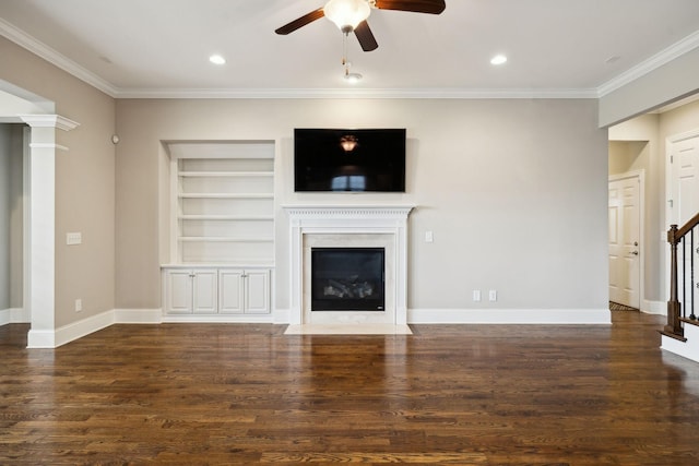 4101 Owen Watkins Ct, Franklin, TN 37067 - unfurnished living room featuring a ceiling fan, ornamental molding, built in shelves, a fireplace with flush hearth, and stairway