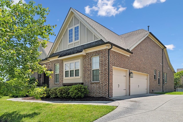 4101 Owen Watkins Ct, Franklin, TN 37067 - view of home's exterior featuring driveway, board and batten siding, brick siding, roof with shingles, and an attached garage