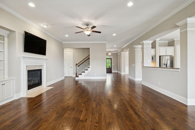 4101 Owen Watkins Ct, Franklin, TN 37067 - unfurnished living room with a high end fireplace, a ceiling fan, recessed lighting, dark wood finished floors, and stairs
