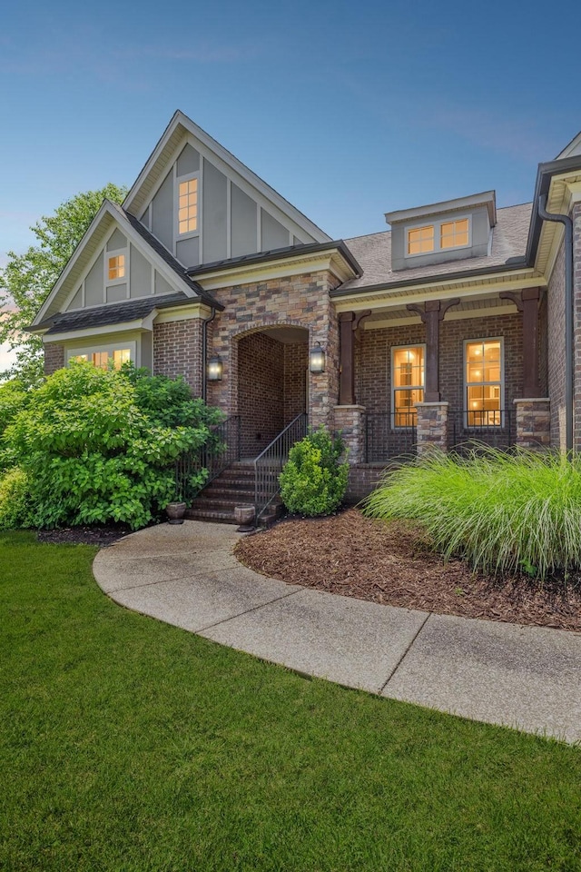 4101 Owen Watkins Ct, Franklin, TN 37067 - view of front of property with a porch, a front yard, and brick siding
