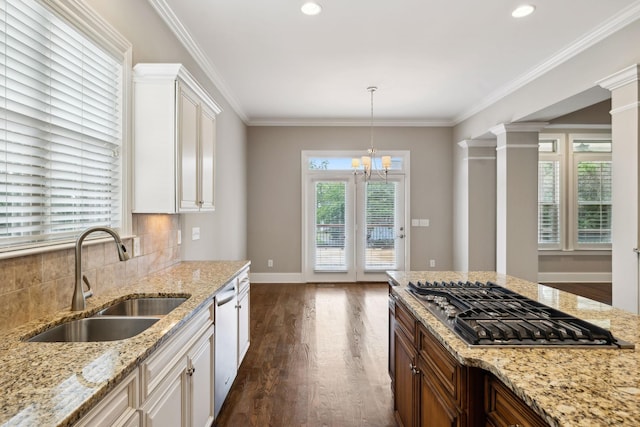 4101 Owen Watkins Ct, Franklin, TN 37067 - kitchen with a sink, appliances with stainless steel finishes, dark wood-style flooring, white cabinetry, and decorative backsplash