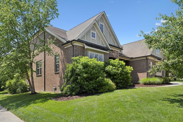 4101 Owen Watkins Ct, Franklin, TN 37067 - view of side of home with brick siding, a lawn, and roof with shingles