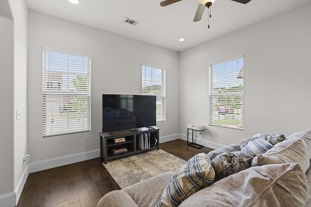 living area featuring baseboards, ceiling fan, recessed lighting, and hardwood / wood-style flooring