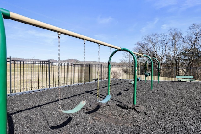community play area featuring fence